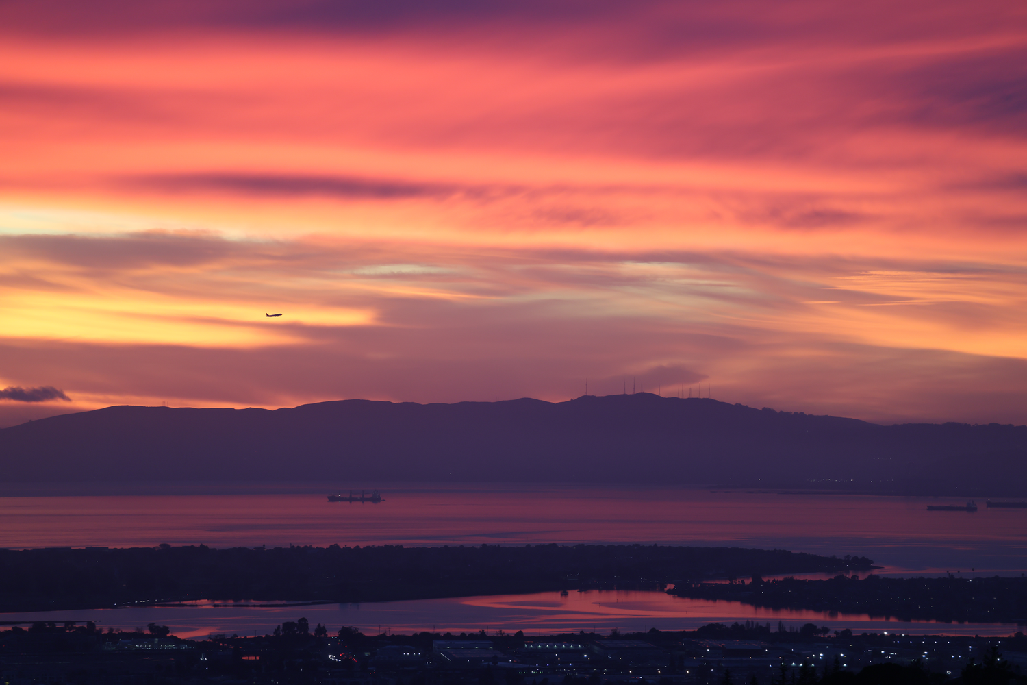 A striking sunset over the Bay Area water.
