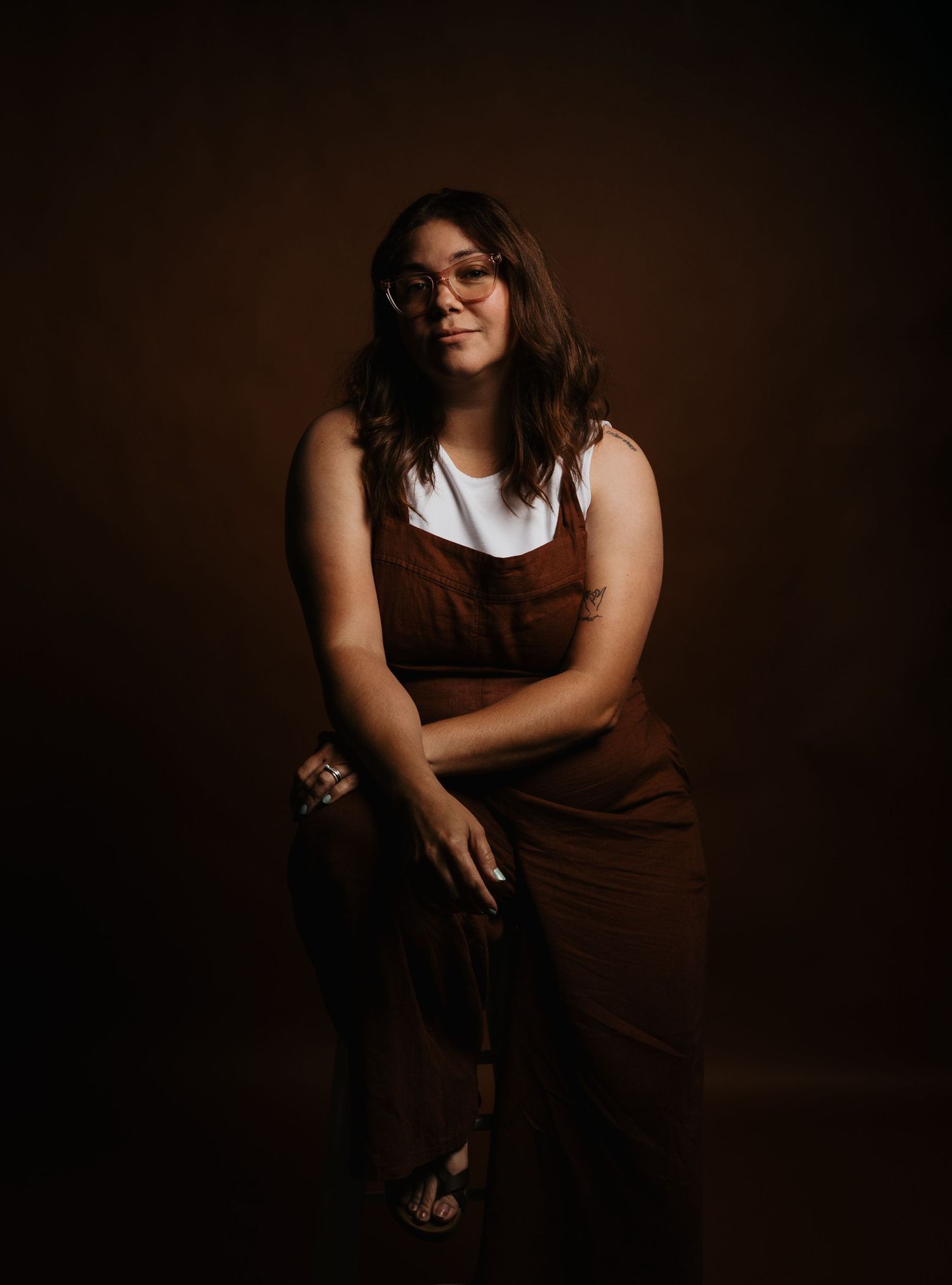 Portrait of photographer Nicolle Aponte providing photography services in Dauphin County, Lancaster County, Adams County and Philadelphia.