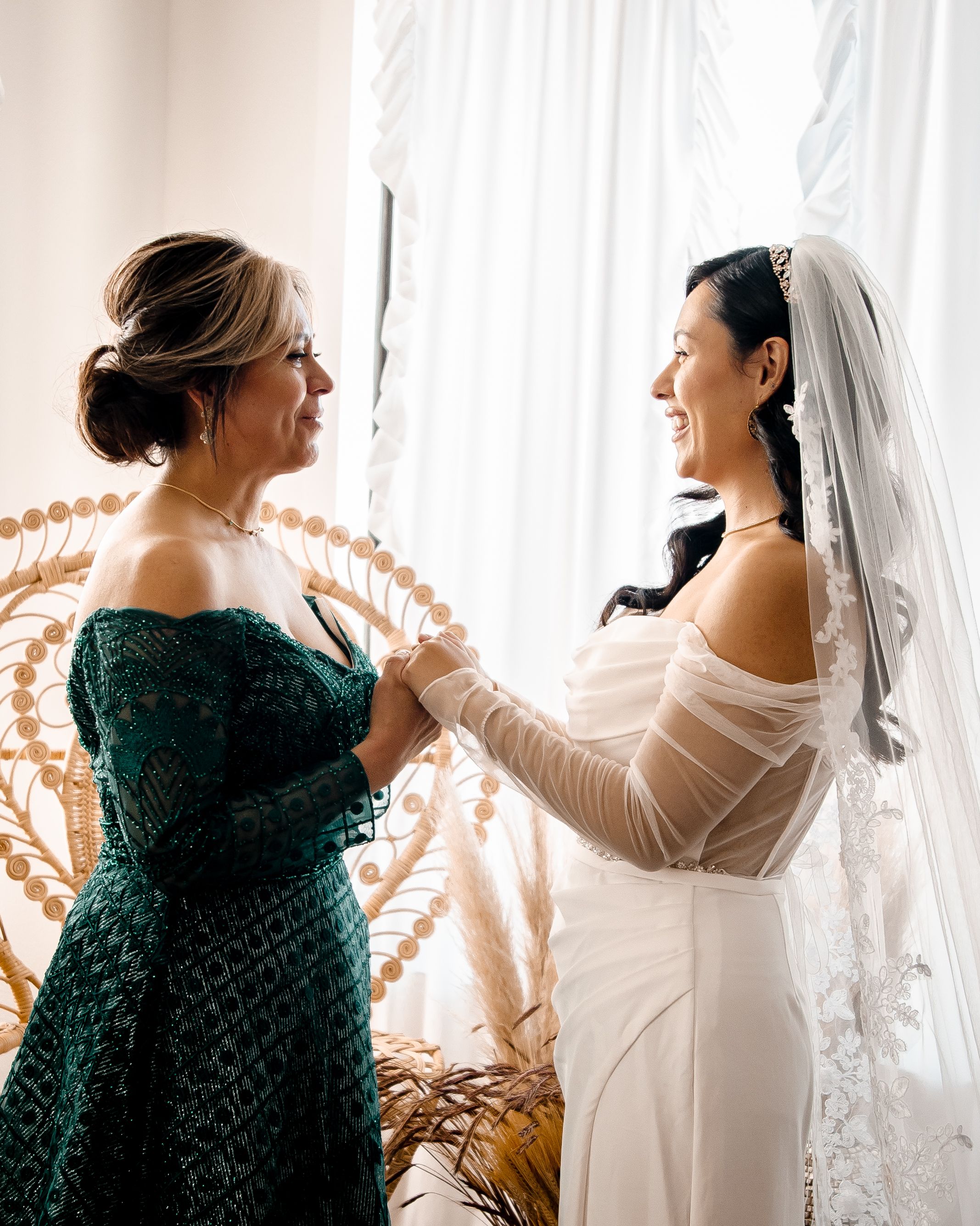 A series of candid wedding preparation moments showing a bride in white and bridesmaid in emerald green getting ready.