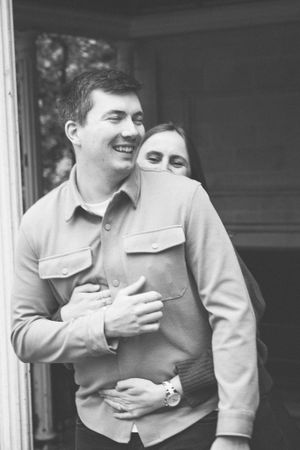 Black and white series of couple laughing together.