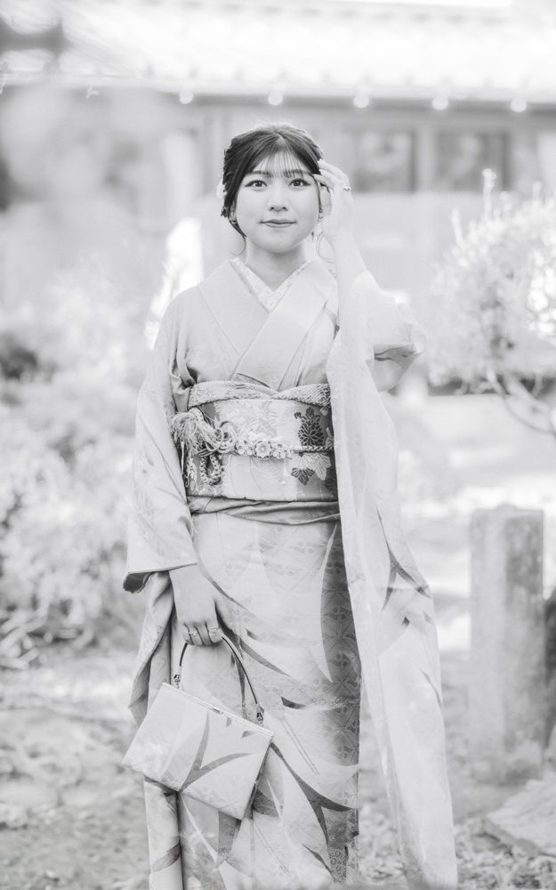 Black and white portrait series showing traditional Japanese kimono and hair styling.