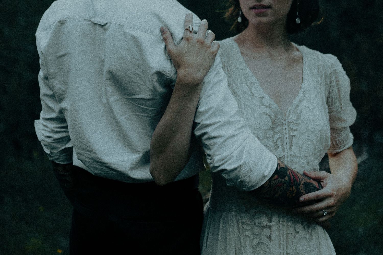 Romantic vintage-style portraits in white clothing against a dark background.
