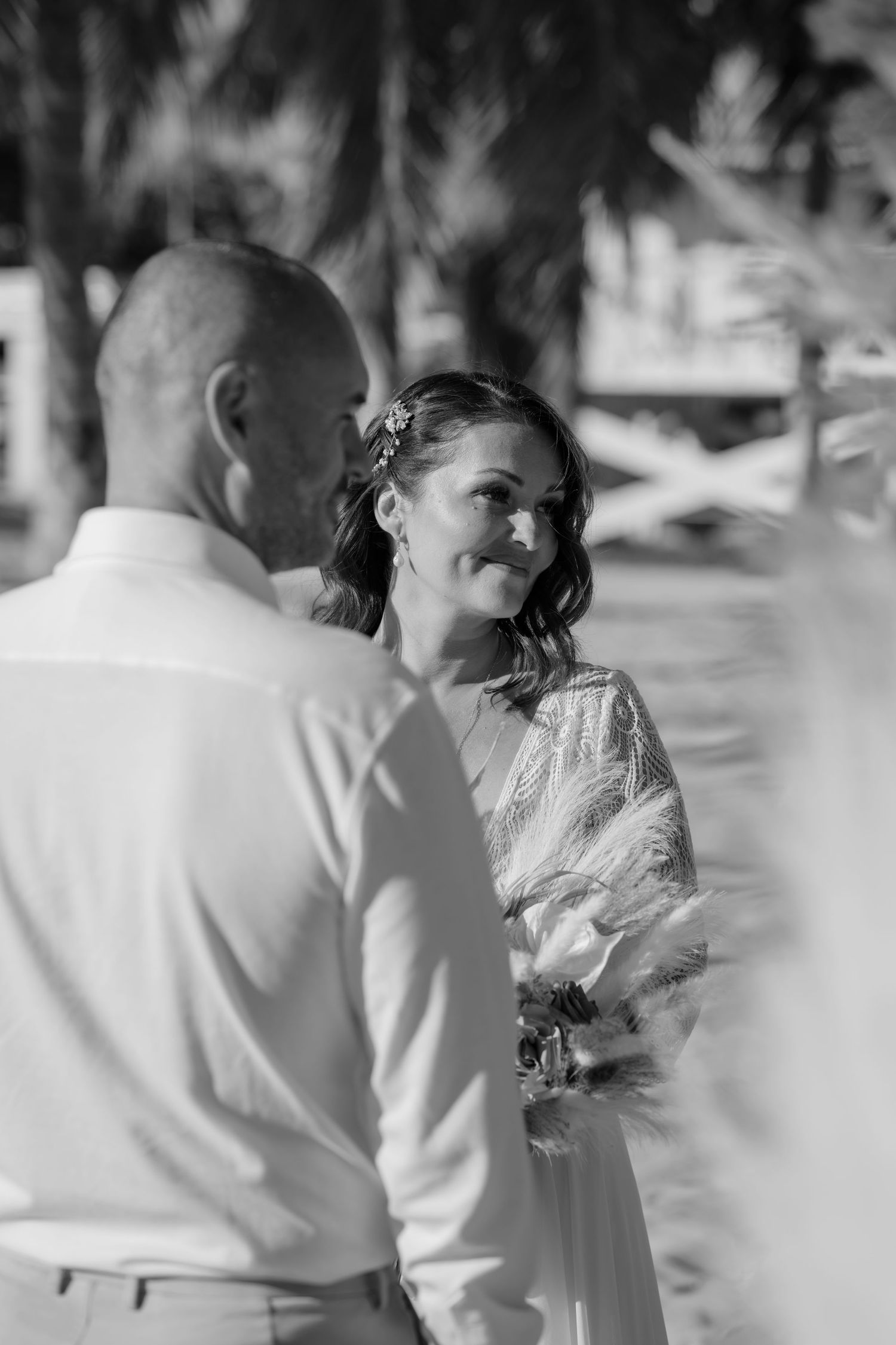 Black and white portrait of wedding couple in natural light.