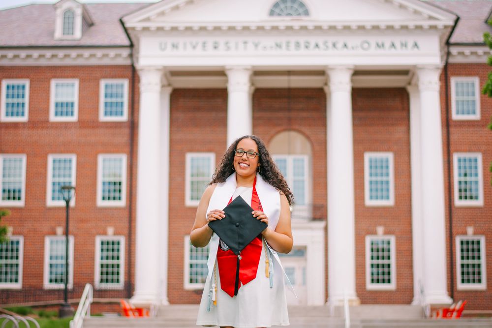 Girl holding graduation cap