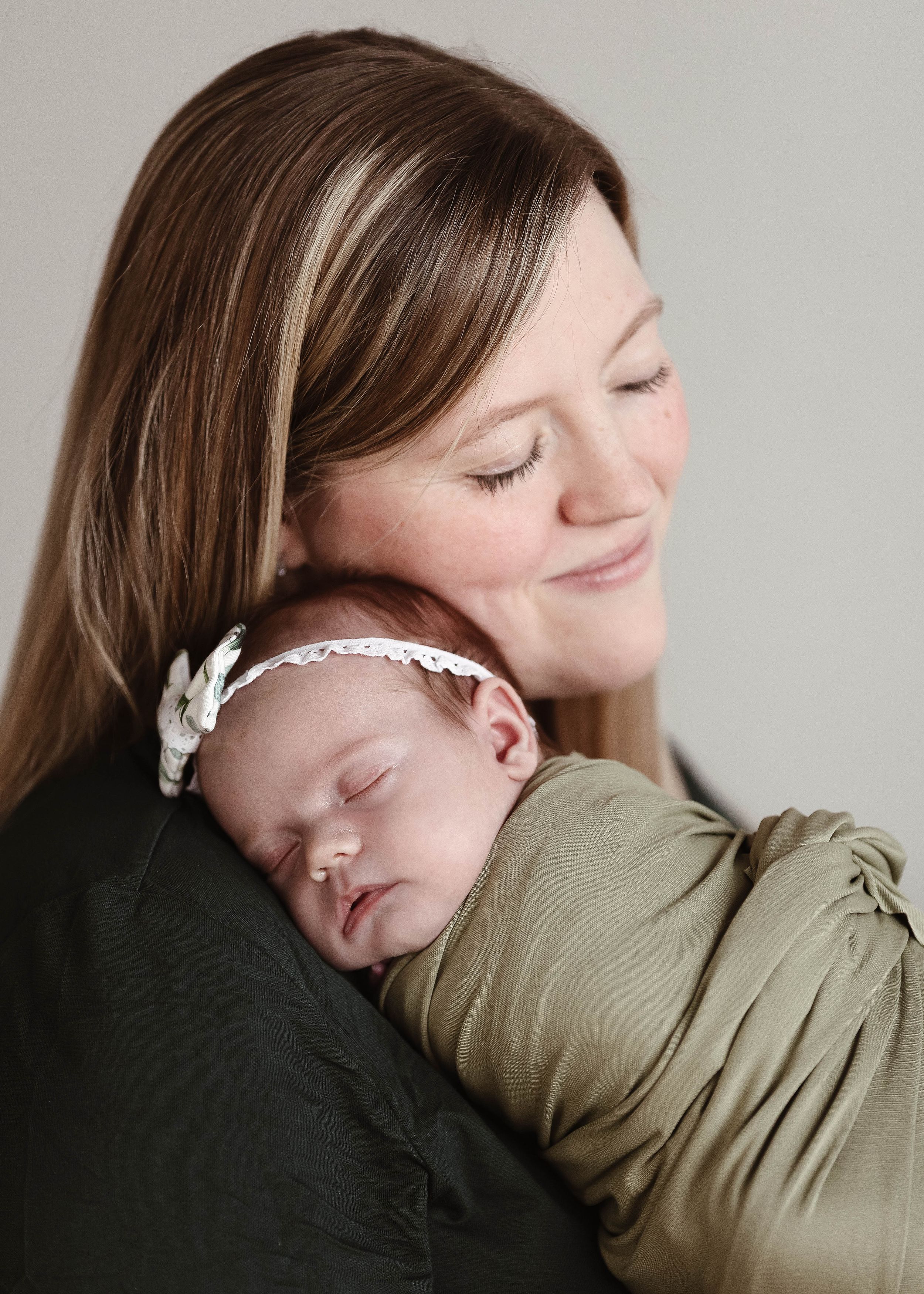 A series of tender close-up shots showing a loving embrace in casual clothing.