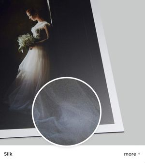 Wedding dress silhouette against dark background with silk texture detail highlighted in circular inset.
