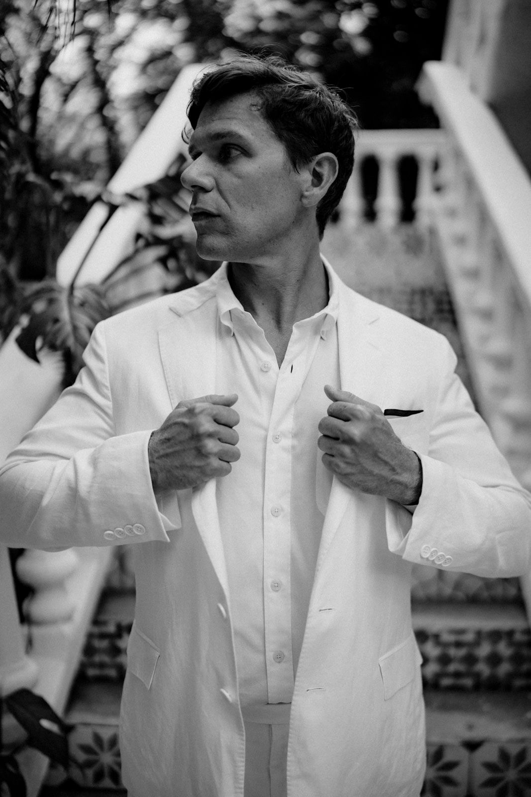 Groom's portraits before heading to the ceremony in Nosara