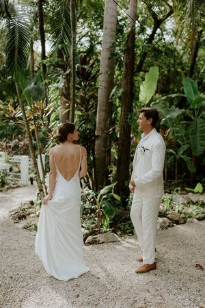 Intimate first look in Nosara boutique hotel garden, Costa Rica wedding photographer Jenn Guillen