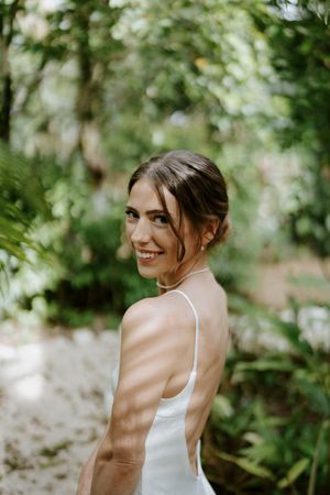 Close-up of bride smiling softly before the ceremony in Nosara, Costa Rica