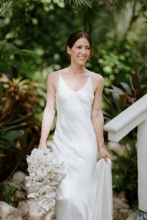Emotional moment as the bride looks out toward the garden before her Nosara wedding