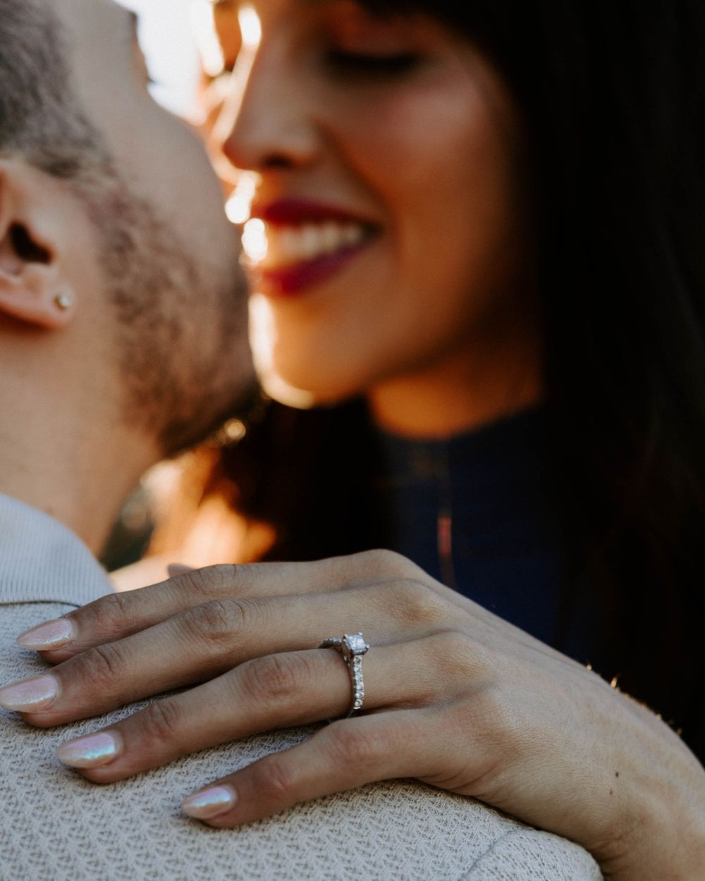 San Antonio Engagement Photography. Close-up portrait showing engagement ring detail in warm sunset lighting.