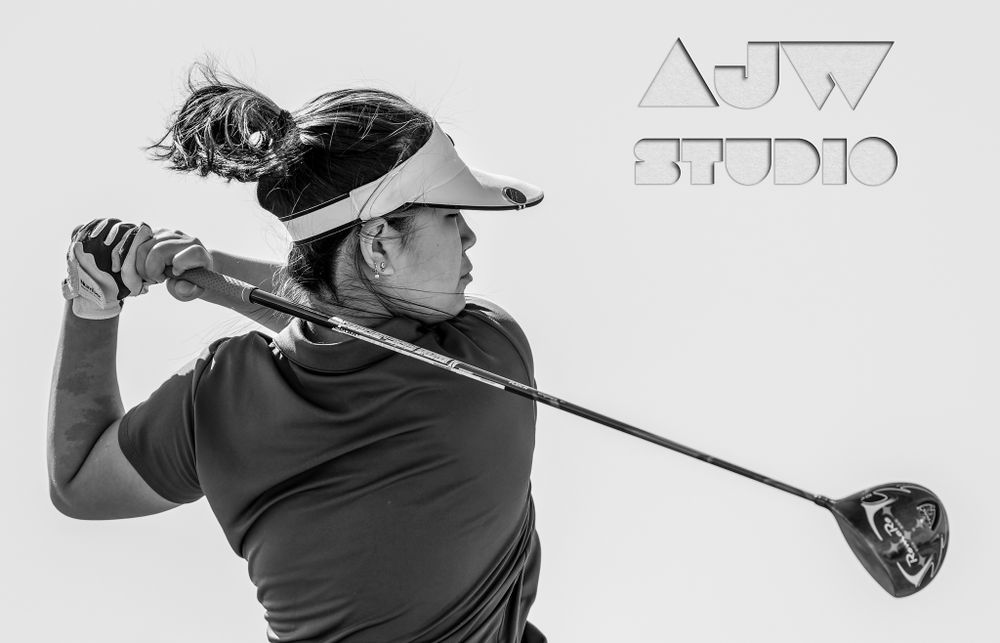 Black and white side profile of golf swing technique.