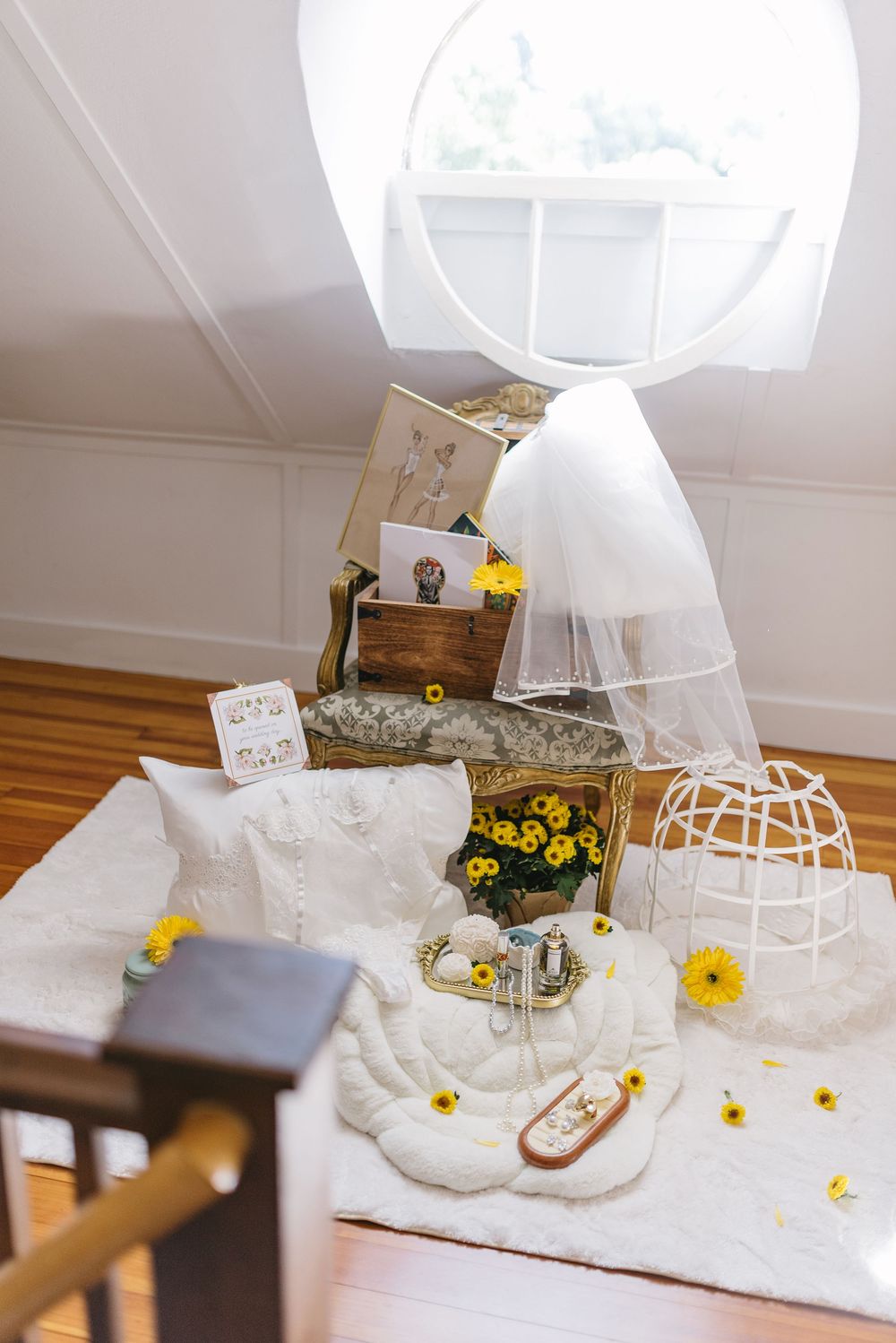 Dreamy bridal setup with yellow flowers and white decor elements.