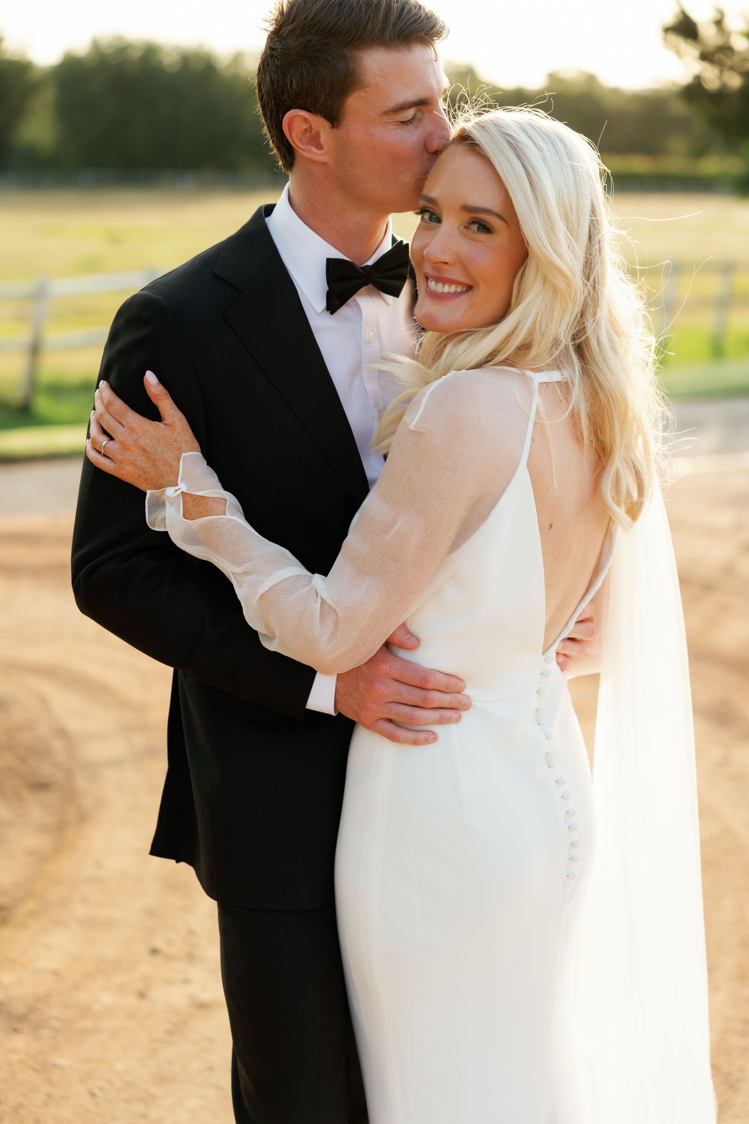 A romantic wedding photo series showing tender moments between newlyweds in golden sunlight.