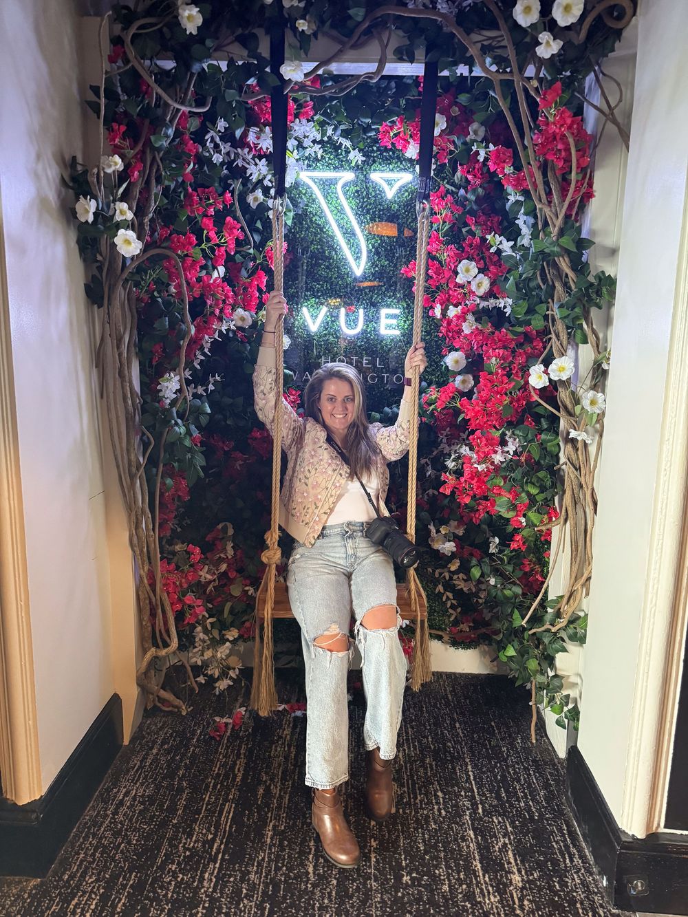 floral swing in front of The Vue rooftop restaurant in DC