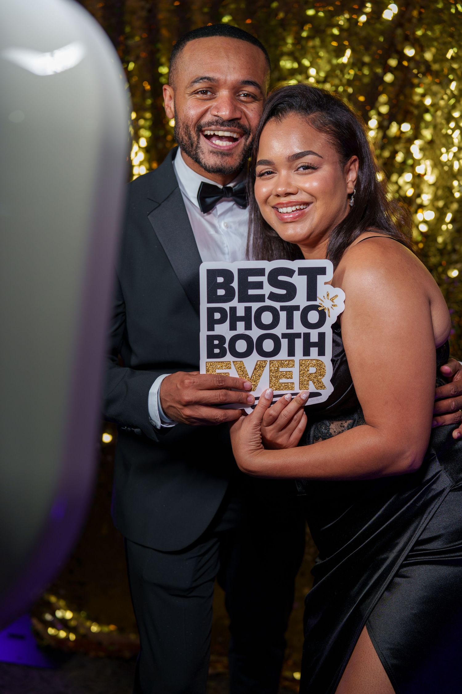 Fun photo booth strip with props and signs celebrating Crystal & Darshan's special day on August 31, 2024.