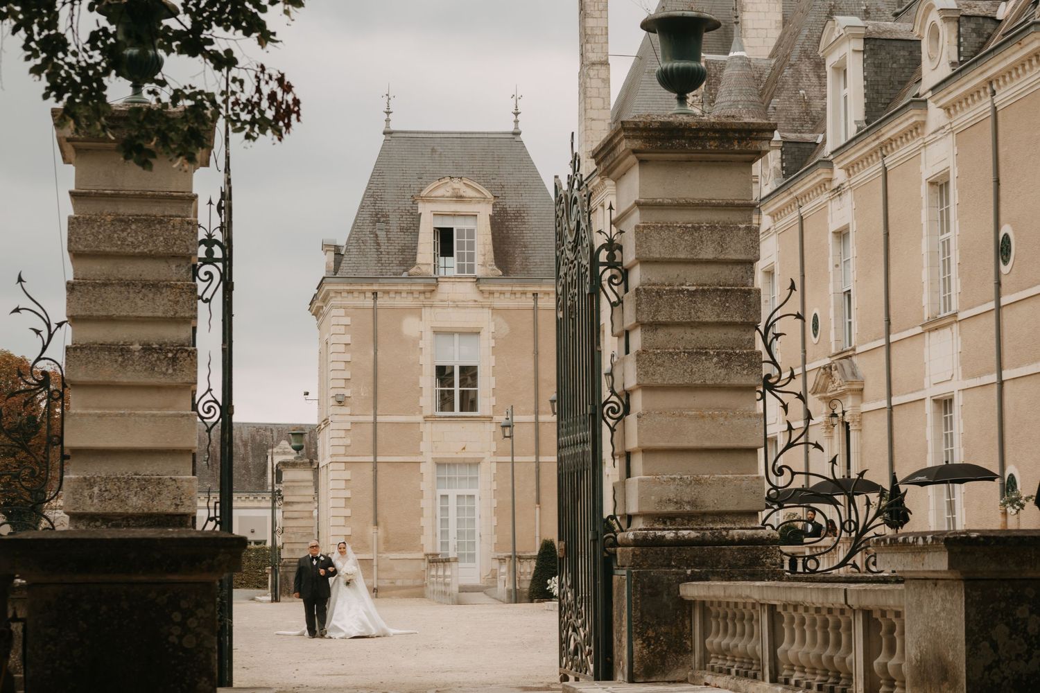 Classic stone architecture and ornate details of a French chateau wedding venue.