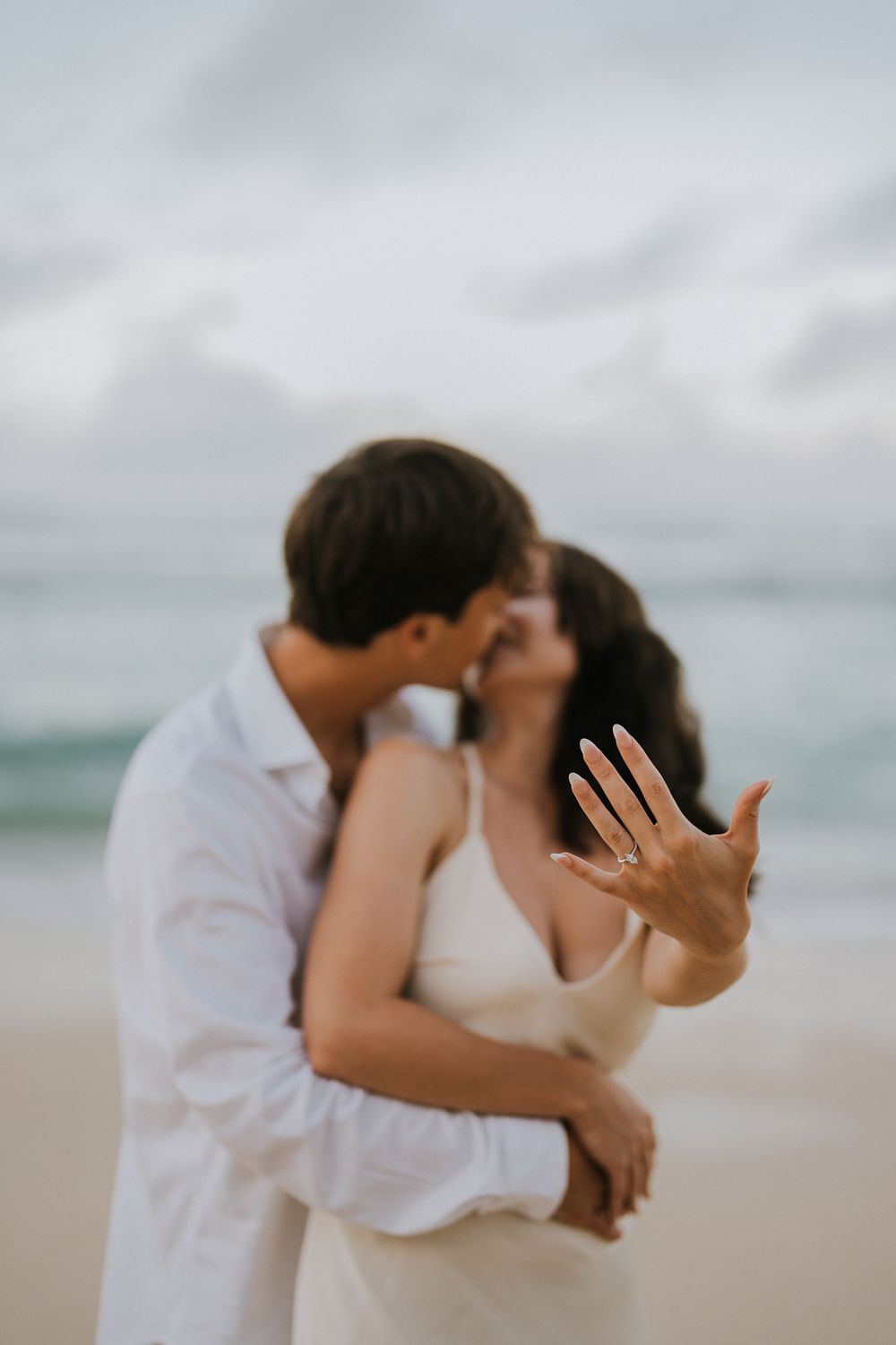 Romantic engagement couple photoshoot at Melasti Beach, Bali.