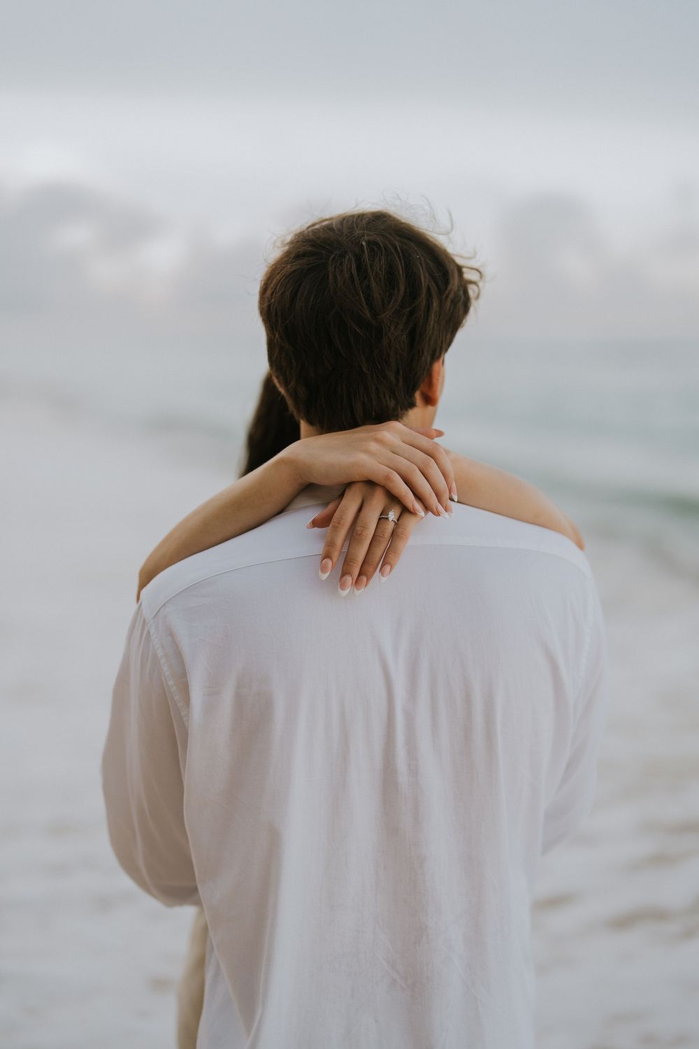 Romantic engagement couple photoshoot at Melasti Beach, Bali.