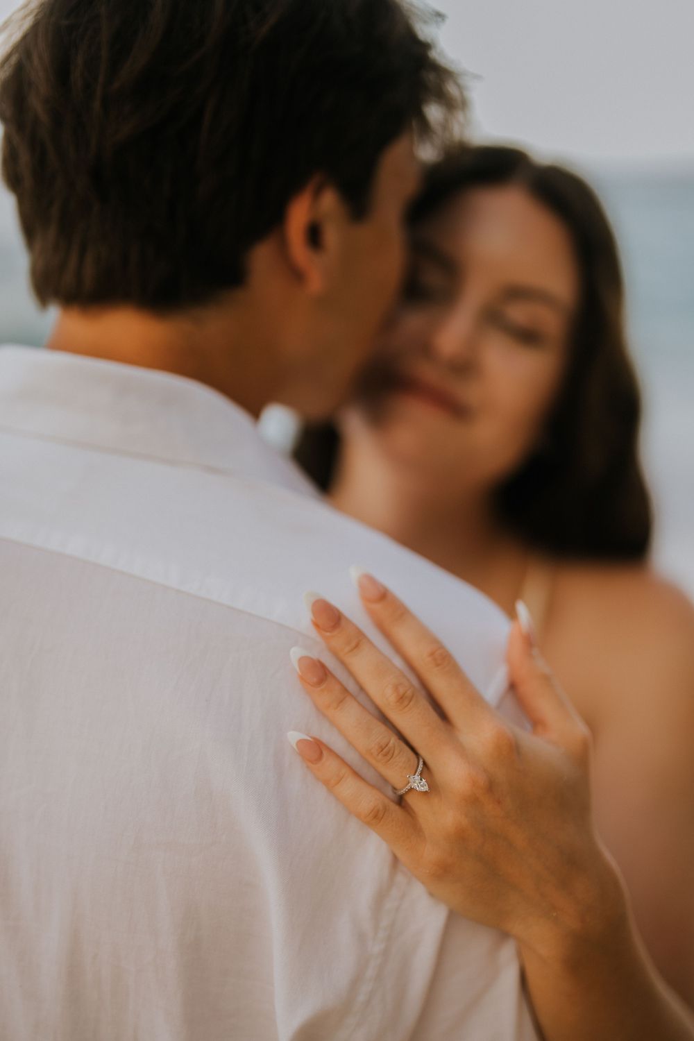 Romantic engagement couple photoshoot at Melasti Beach, Bali.