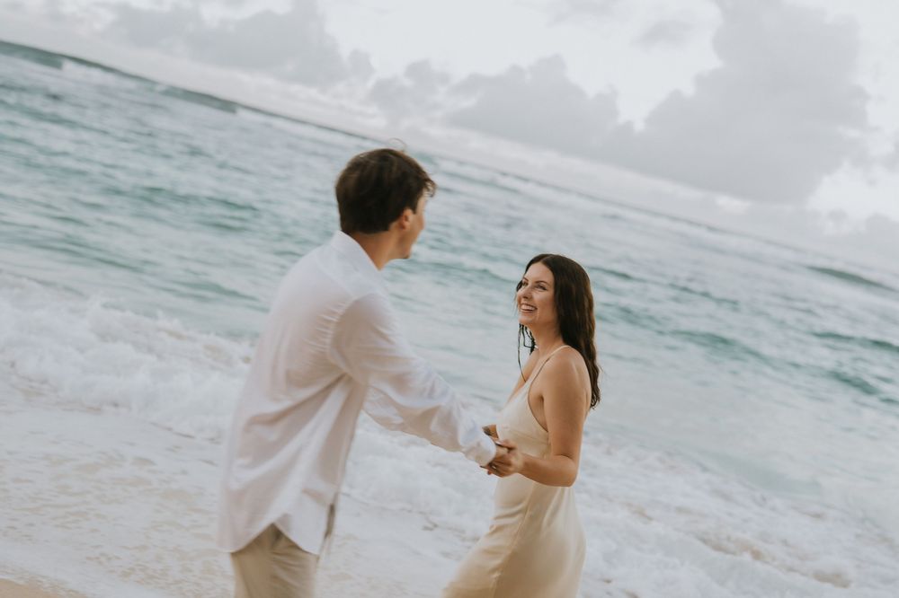 Romantic engagement couple photoshoot at Melasti Beach, Bali.