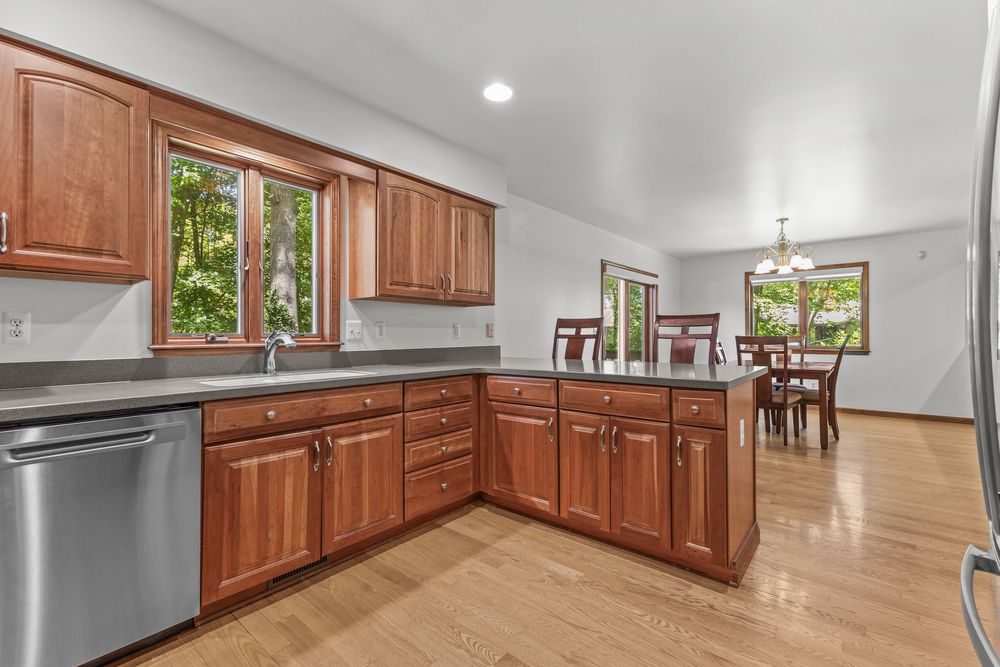 Modern kitchen with island in Metamora Michigan home
