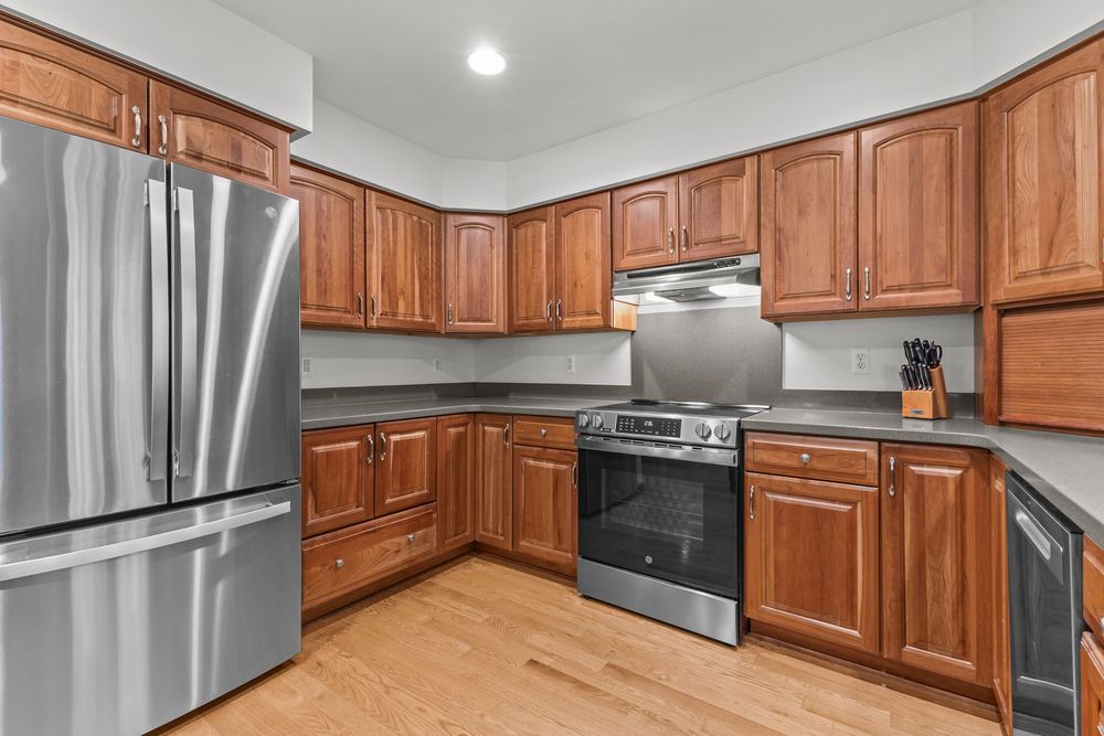 Modern kitchen with island in Metamora Michigan home