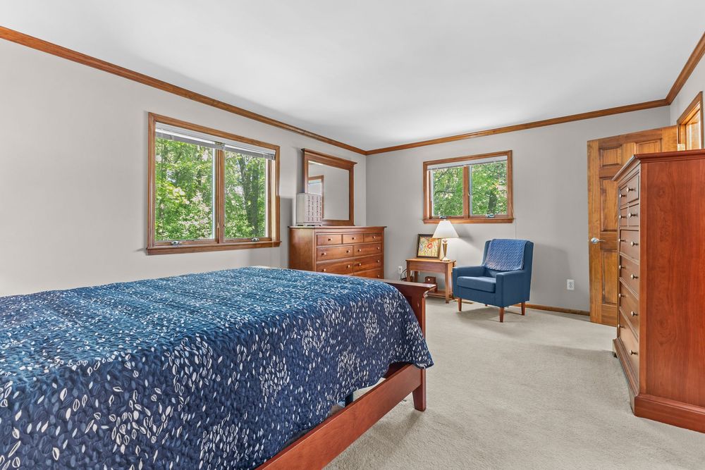 Primary bedroom in luxury Metamora Michigan home