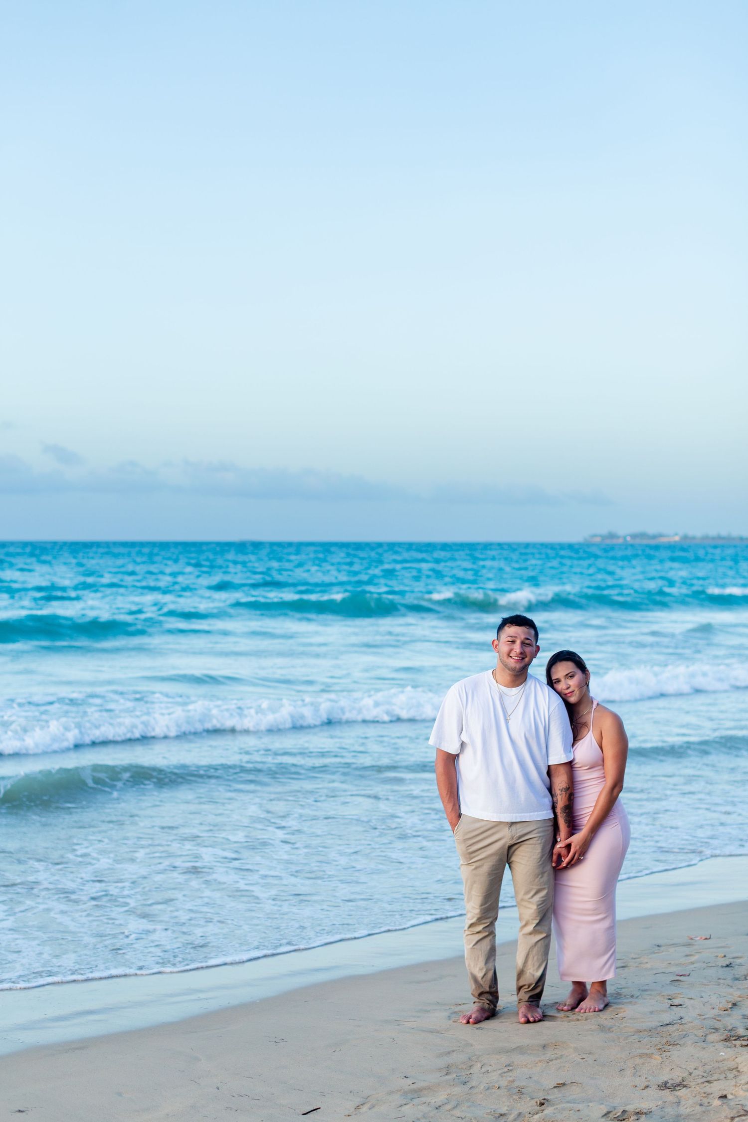 Couples portrait at the beach in Isla Verde, Carolina, Puerto Rico.