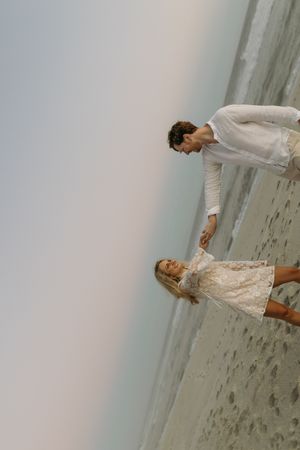 West Coast Engagement Shoot. Couple at beach. Pastel Sunset. Cape Town South African Wedding Photographer Documentary Editorial