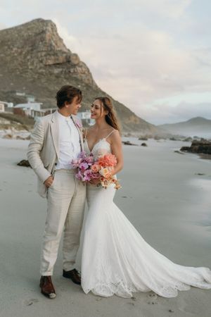 Misty Cliffs Intimate Wedding. Bright bouquet. Peonies. Beach Wedding. Cape Town South African Wedding Photographer Documentary Editorial