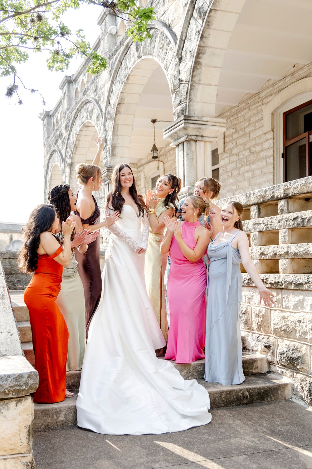 Luxury downtown austin wedding featuring colorful bridesmaids.