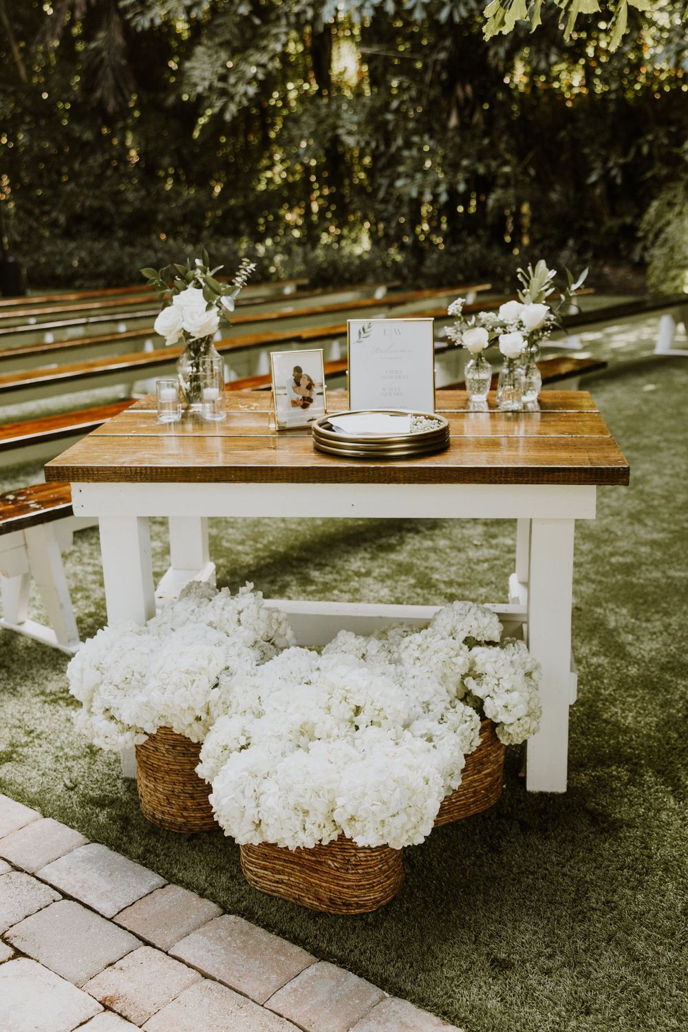 Ceremony details at wedding in Fort Pierce, Florida at The Lake House wedding venue captured by Lindsay McDow Photography. Big tree, green