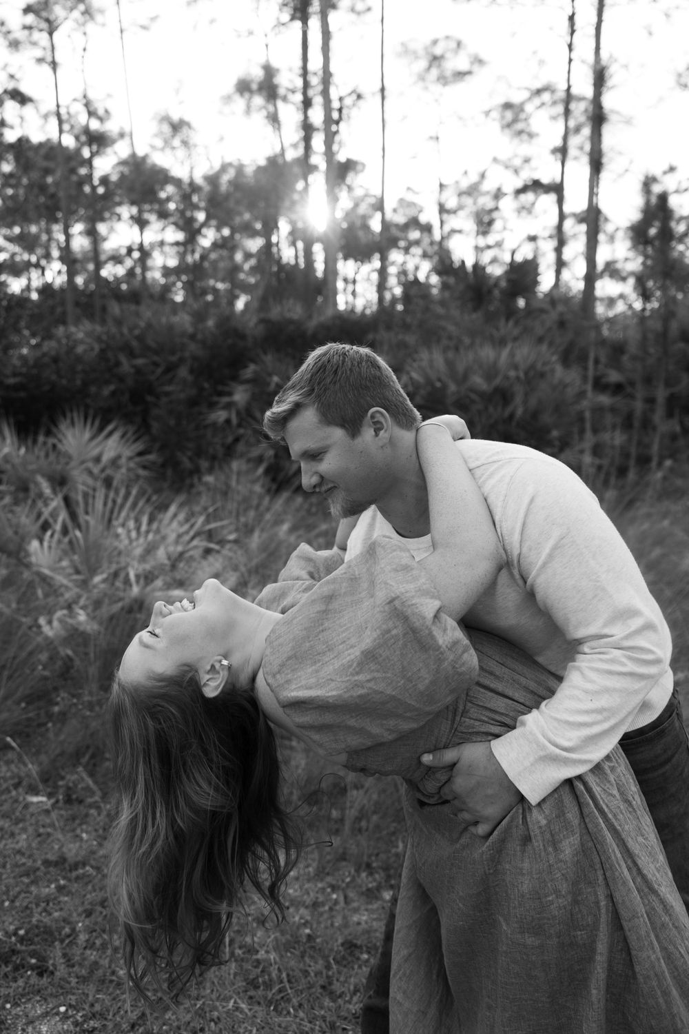 Woodsy, golden hour engagement photos at a nature trail in West Palm Beach, Florida captured by Lindsay McDow Photography