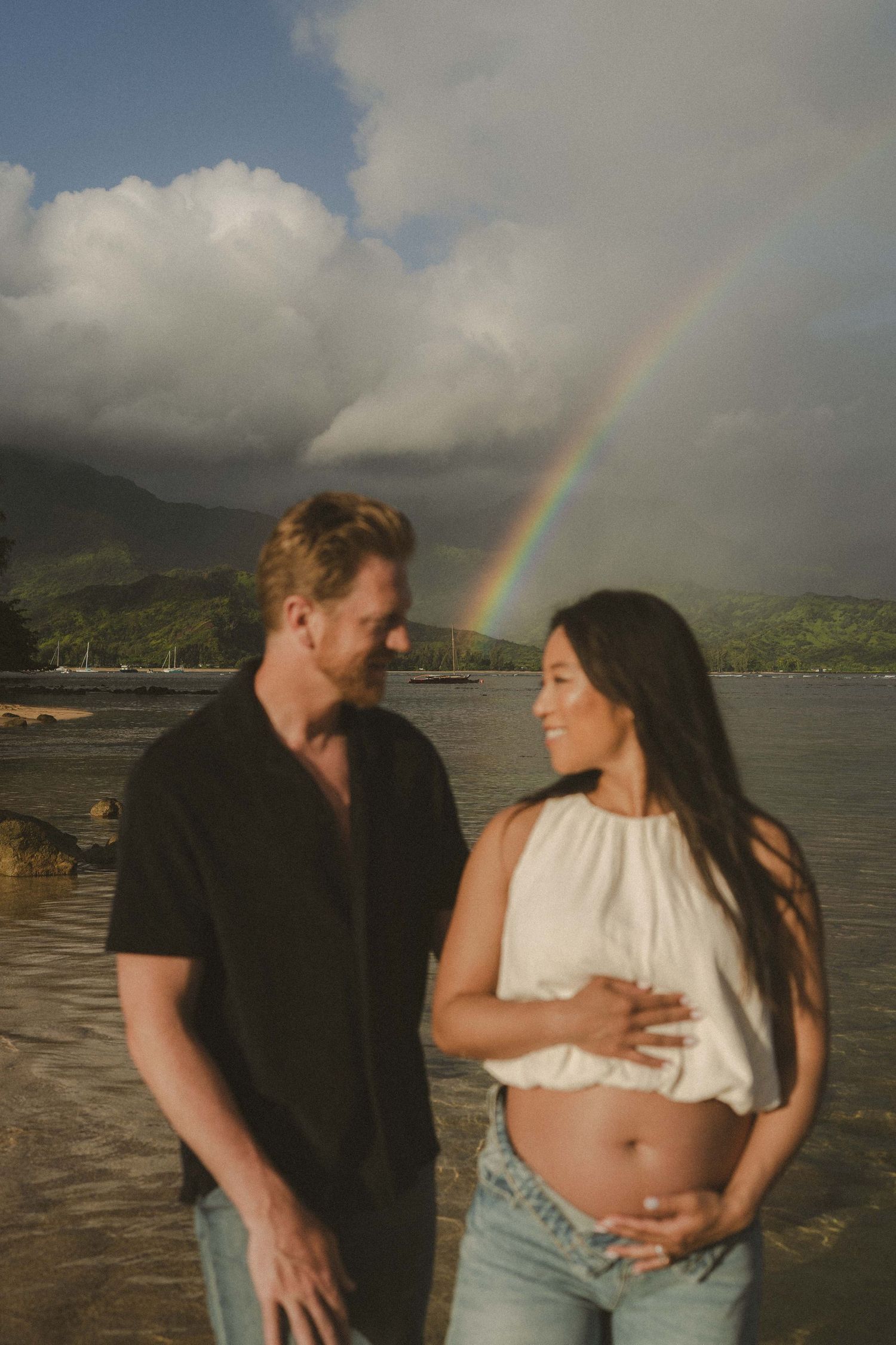 Maternity photos with rainbow by Kauai Photographer