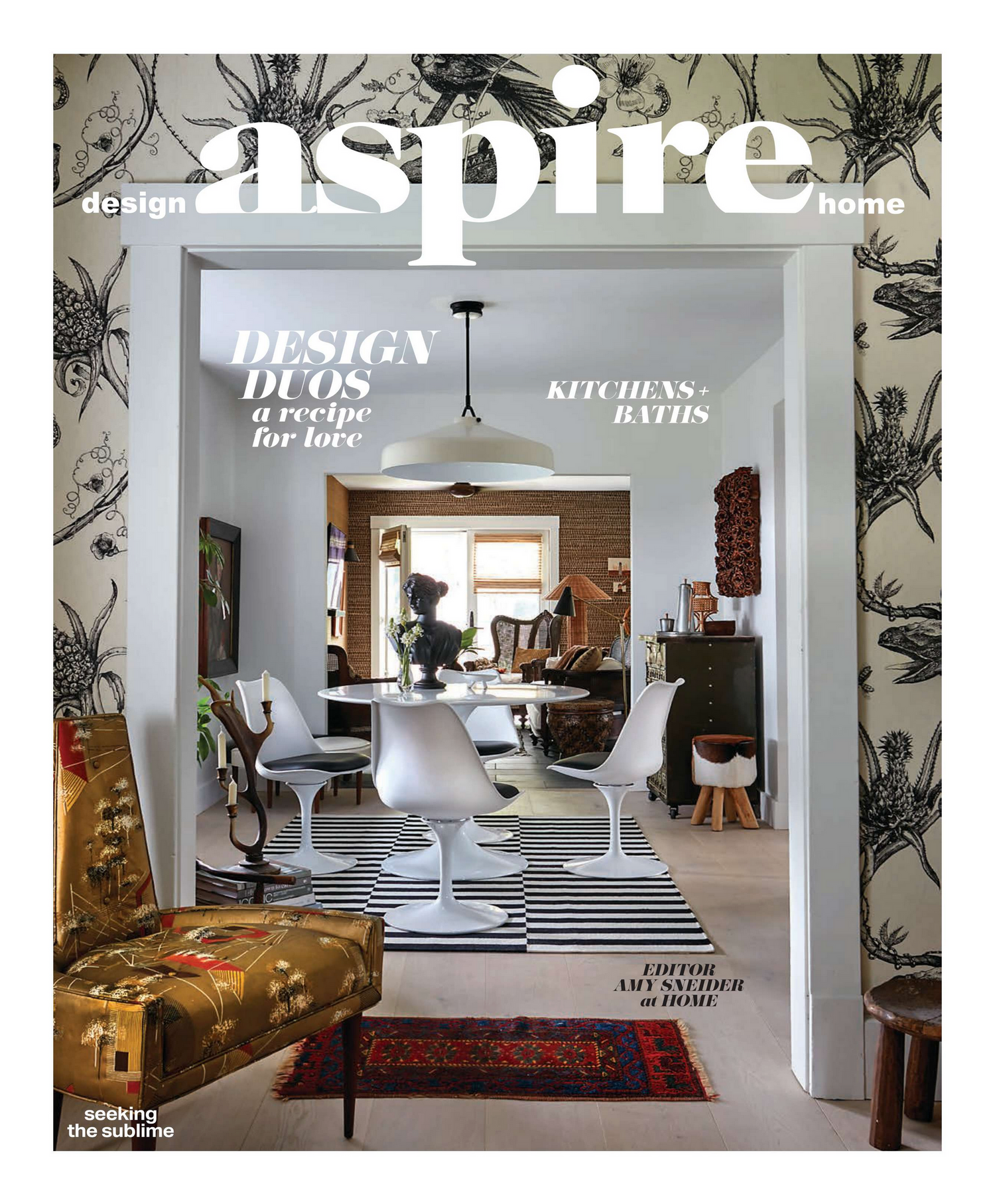 Magazine cover showing a modern interior design with black and white geometric patterns and stylish furniture.