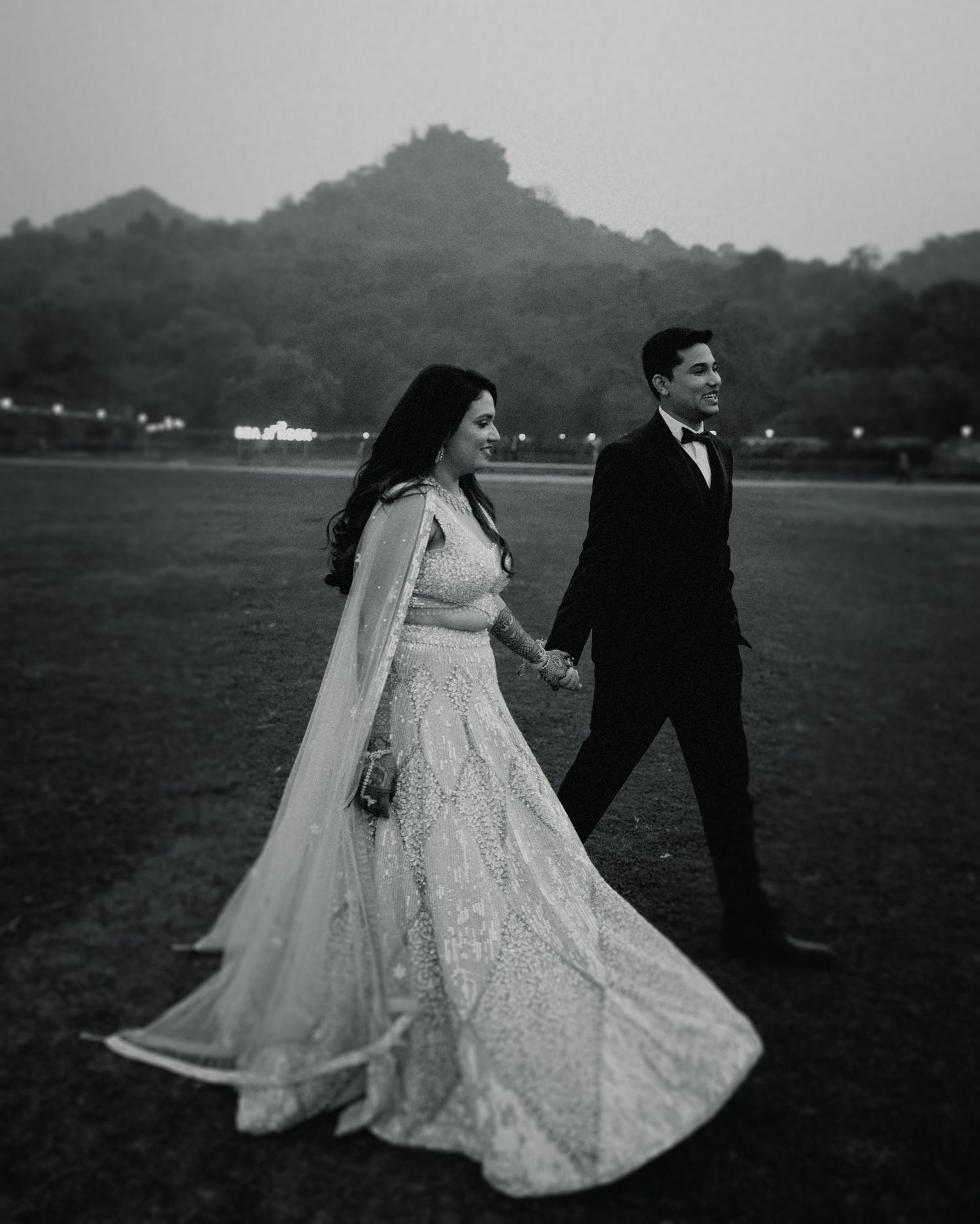 Timeless black and white wedding photography with a couple in mist, shot by a wedding Photographer in Mumbai, Wedding photographer near me.