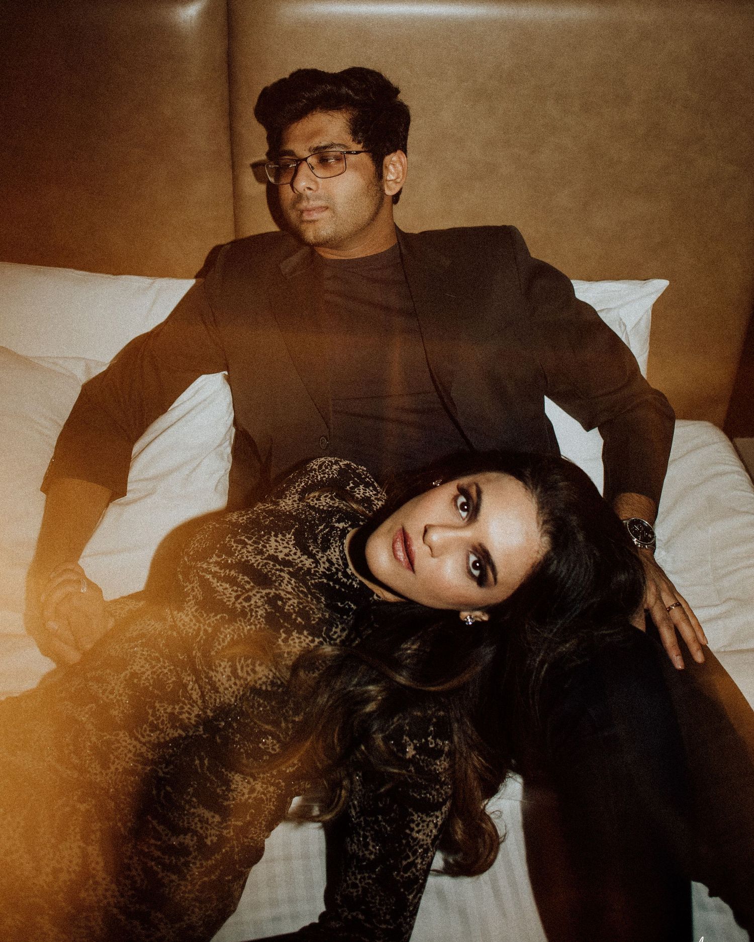 Artistic sepia-toned wedding portraits with dramatic lighting, beautifully captured by a professional wedding photographer in Mumbai.