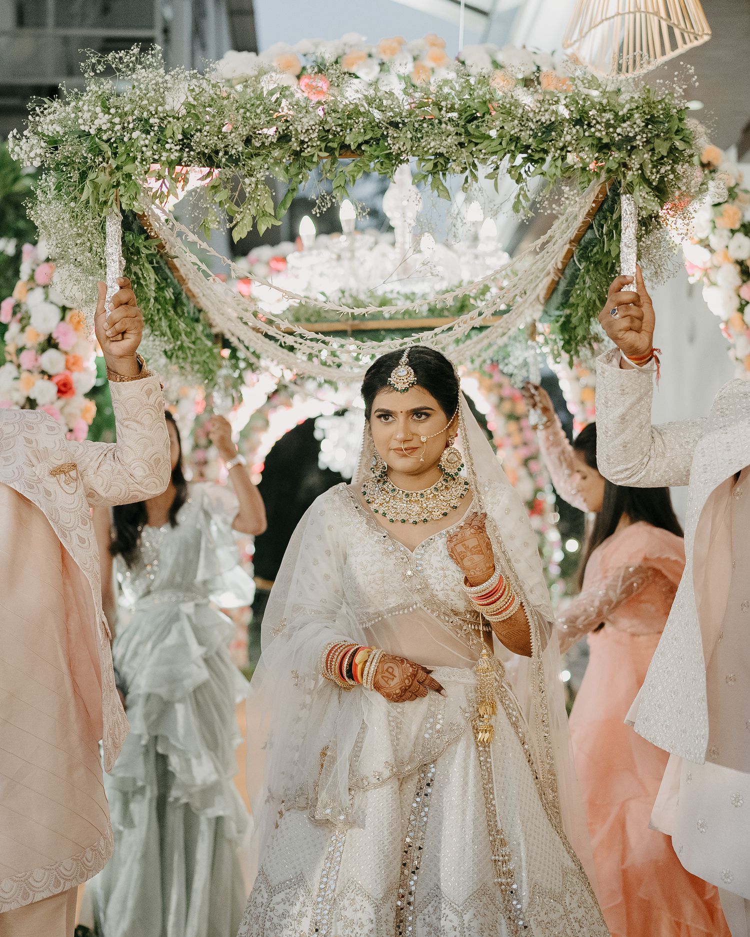 Traditional wedding ceremony with floral mandap & pink accents, beautifully captured by a wedding photographer in Mumbai.