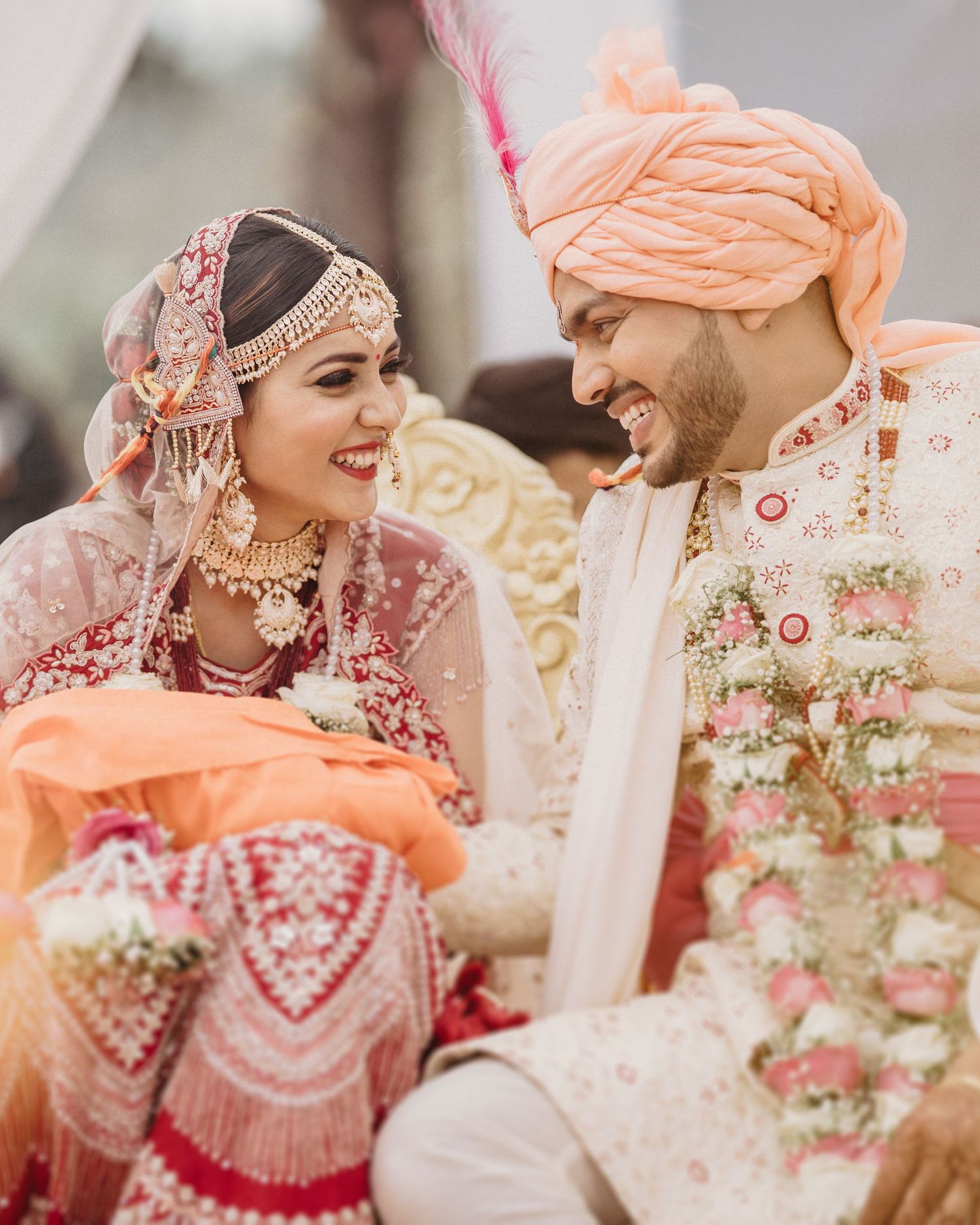 Looking for wedding photographer in Mumbai? Joyful candid traditional Indian wedding couple moments by Mumbai's finest wedding photographer.