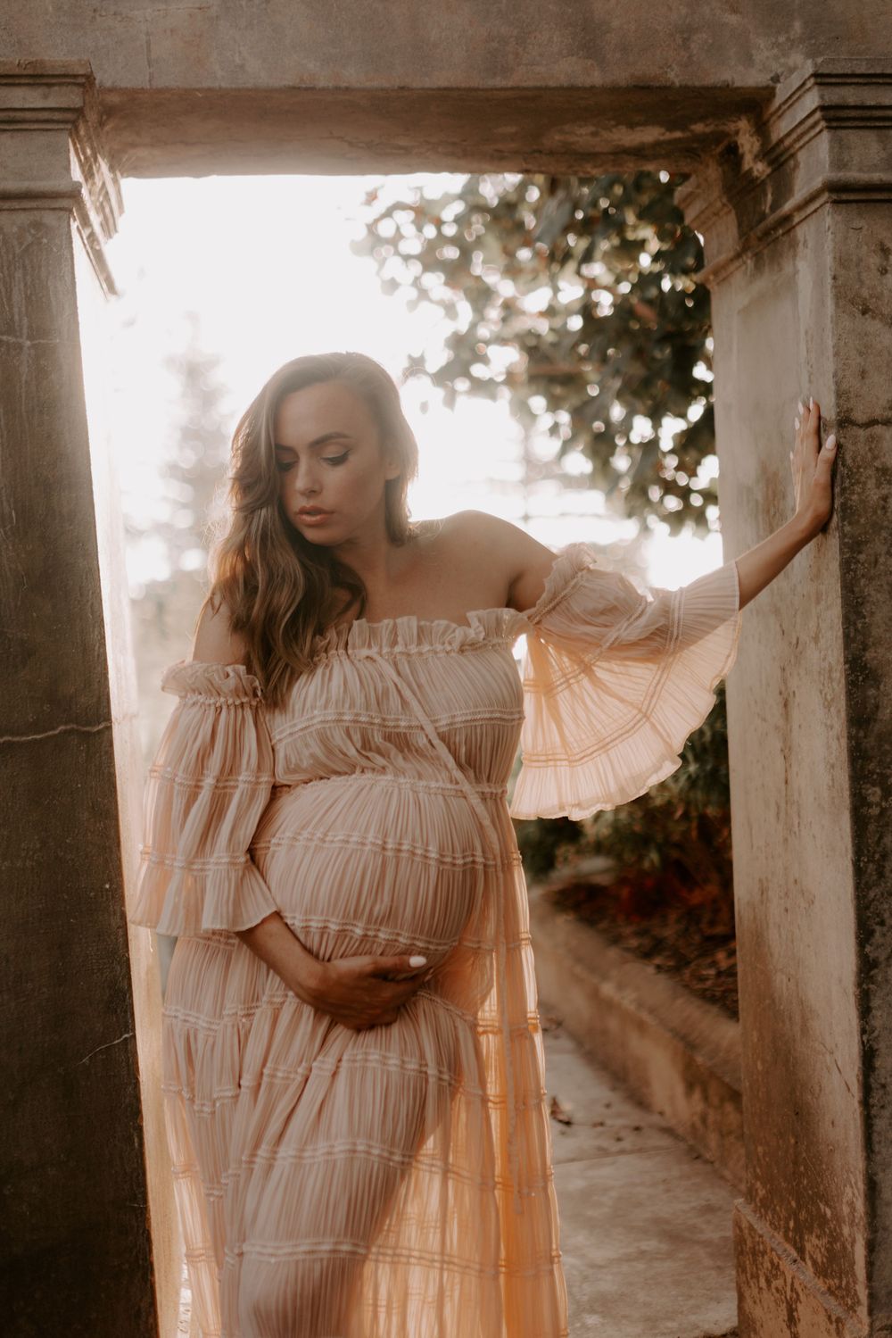 Artistic portrait series showcasing flowing white fabric against vintage architecture.