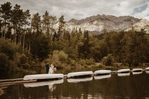 Bride and groom outdoors with mountain views at Golden BC wedding