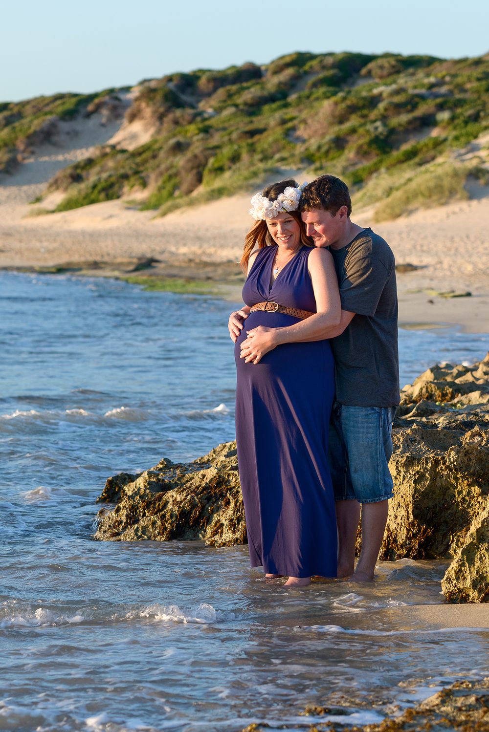 Pregnant woman with partner at the beach - Kelly Chapman Photographer Perth