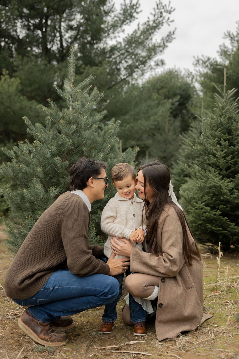 A heartwarming family moment captured in sequence at a Christmas tree farm showing tender interactions with a family dressed in brown