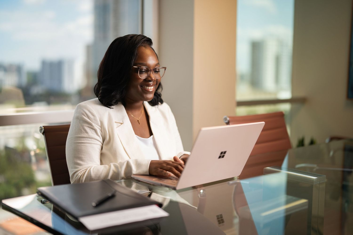 Orlando headshot photographer — professional lifestyle branding portrait of businesswoman in office setting