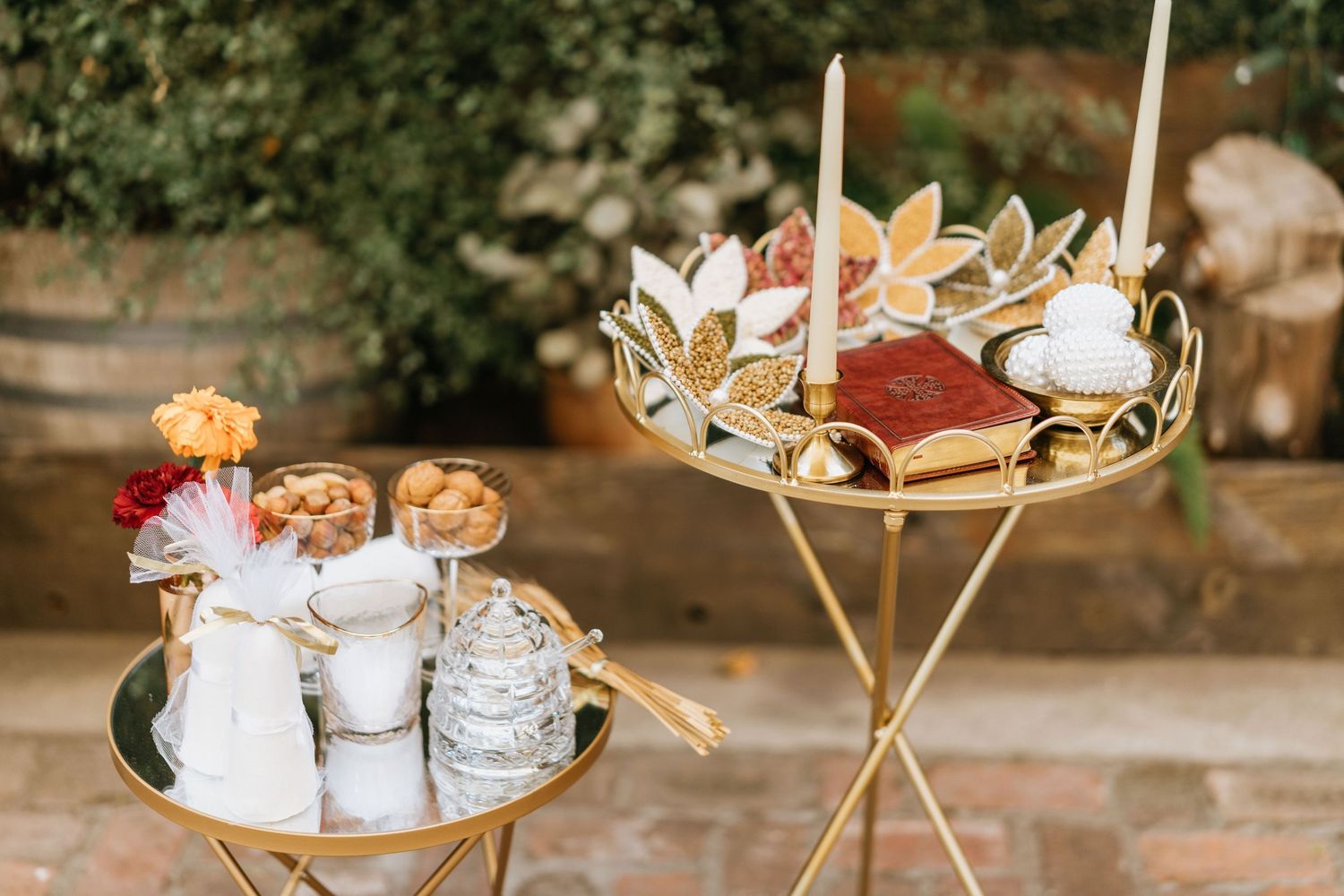 Wide view of the ceremony table with ceremonial details and floral accents before guests arrive.