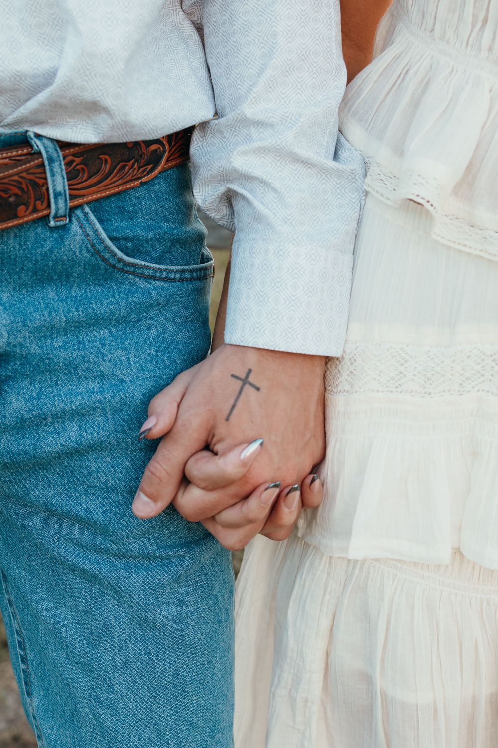 Couple holding hands