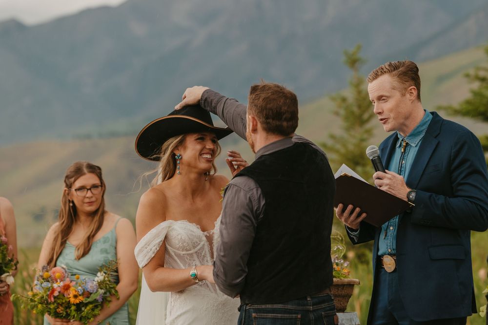 Ceremony at Copper Rose Ranch on her rainy wedding day in Pray, Montana Paradise Valley captured by Emigrant Wedding photographer