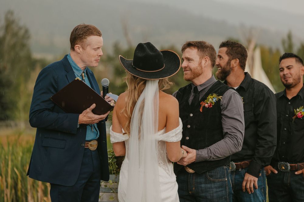 Ceremony at Copper Rose Ranch on her rainy wedding day in Pray, Montana Paradise Valley captured by Livingston, Montana Wedding photographer