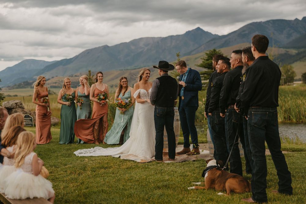 Ceremony at Copper Rose Ranch on her rainy wedding day in Pray, Montana Paradise Valley captured by Emigrant Wedding photographer